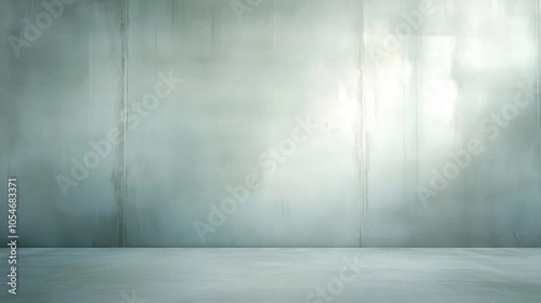 Fototapeta A large, empty room with a grey wall
