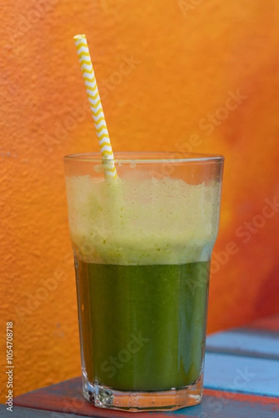 Fototapeta green smoothie drink isolated against a backdrop