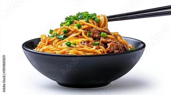 Obraz A photostock of a bowl of ramen on a white background, topped with egg and green onions.