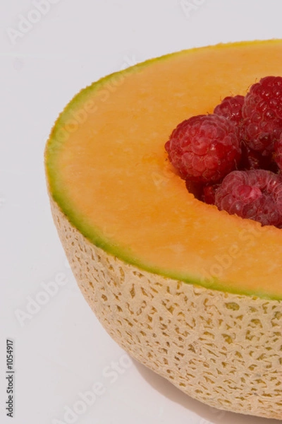 Fototapeta melon with raspberries