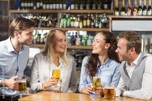 Obraz Friends talking while holding beer