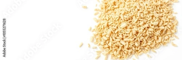 Fototapeta Closeup of a small handful of psyllium husk, showing the texture and natural color on a white background, dietary, fiber