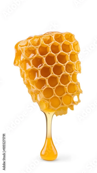 Fototapeta Golden honeycomb dripping with honey, isolated on white background.