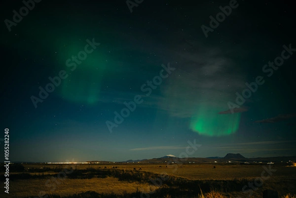 Obraz Aurora borealis above Icelanding farm on the night sky