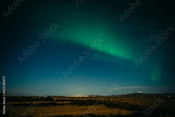 Obraz Aurora borealis above Icelanding farm on the night sky