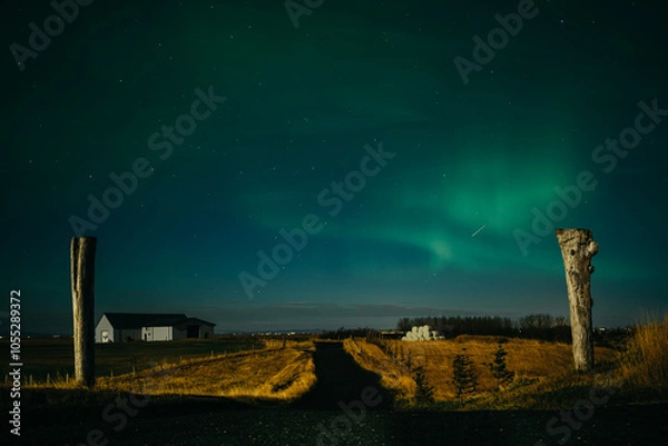 Obraz Aurora borealis above Icelanding farm on the night sky