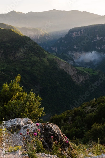 Obraz Golden hour before sunset in Albanian mountains, Progonat Albania.Valley with clouds. Mountains in the background