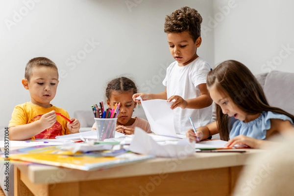 Obraz Children engaged in creative activities at a table