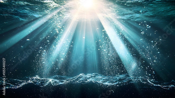 Fototapeta Underwater sunlight with rays and bubbles.