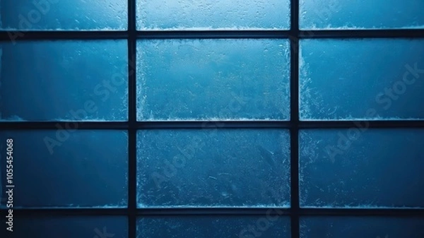 Fototapeta Cold light shining through frosted glass, icy edges catching the glow, frosty window  cold  light, winter light elegance