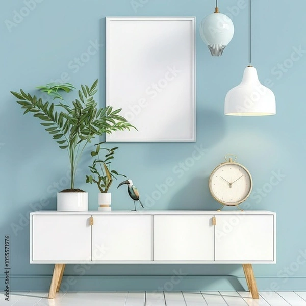 Fototapeta A white cabinet with two potted plants. a bird figurine. a clock. and two hanging light fixtures against a blue wall with a white frame mockup