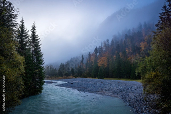 Fototapeta creek in mountains of karwendel in autumn at sunrise with fog