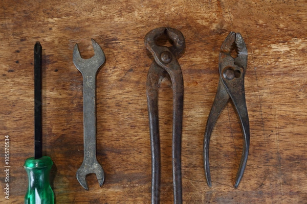 Obraz Old tools on a wooden table