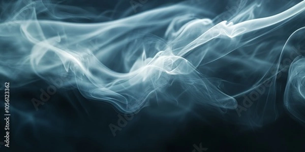 Obraz Abstract Smoke Swirls on Dark Background. featuring delicate swirls of smoke on a dark, moody backdrop