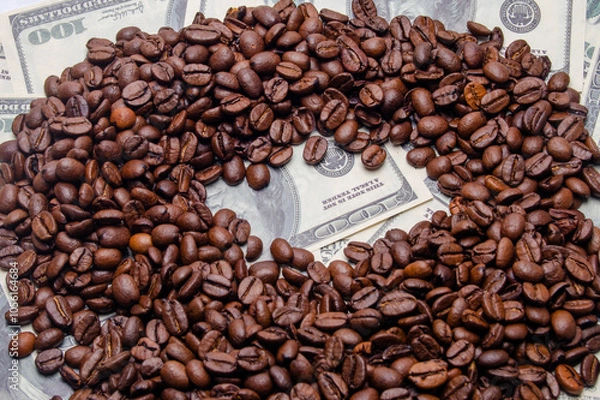 Obraz coffee as a business, coffee beans on the background of dollars