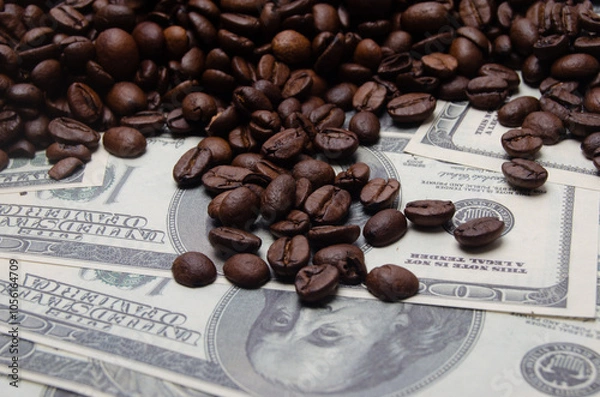 Obraz coffee as a business, coffee beans on the background of dollars