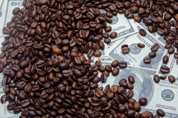 Obraz coffee as a business, coffee beans on the background of dollars