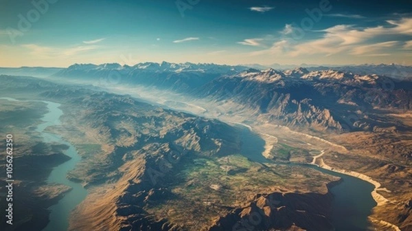 Fototapeta An aerial view of Argentina highlighting geographical features such as mountains and rivers, overlaid with a map outline.