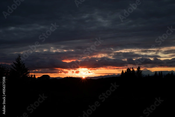 Fototapeta sunset in the clouds