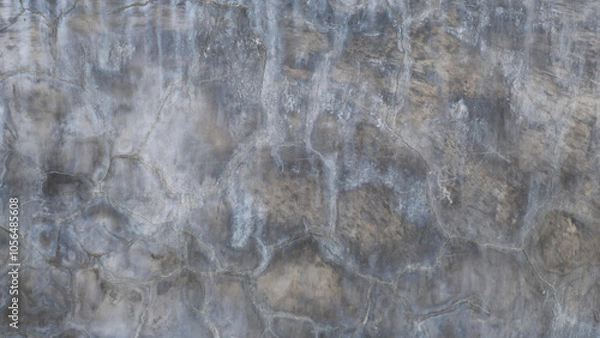Fototapeta Textured surface with hexagonal pattern, showcasing natural stone colors and variations. surface appears weathered and unique, adding depth and interest