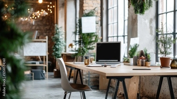 Fototapeta Open office space decorated for Christmas holidays with trees and ornaments, creating warm and festive atmosphere at workplace	