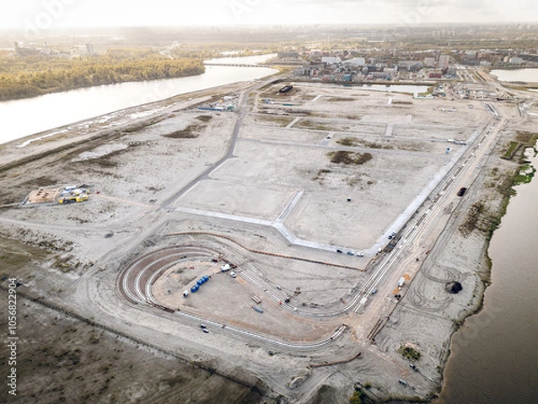 Obraz Strandeiland construction site in Amsterdam, early-stage infrastructure development for sustainable housing on this artificial island in IJburg. Aerial view.
