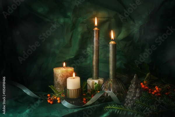 Fototapeta Fourth Advent with four lit candles, fir twigs, red orange berries and Christmas decoration, dark and moody green background, holiday concept, copy space, selected soft focus