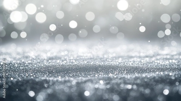 Obraz Abstract background with white silver glitter and grey bokeh lights featuring stars perfect for holiday themes