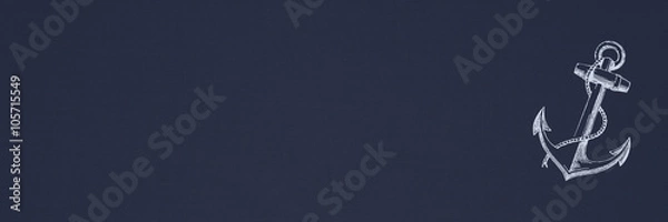 Obraz Klassischer Anker auf blauem Leinenstoff-Hintergrund / Banner 