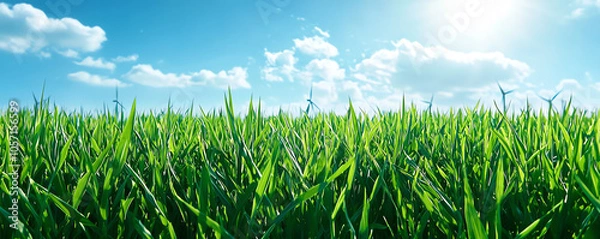 Fototapeta Vibrant green fields with electric turbines, bright skies, symbolizing renewable energy's integration with agriculture