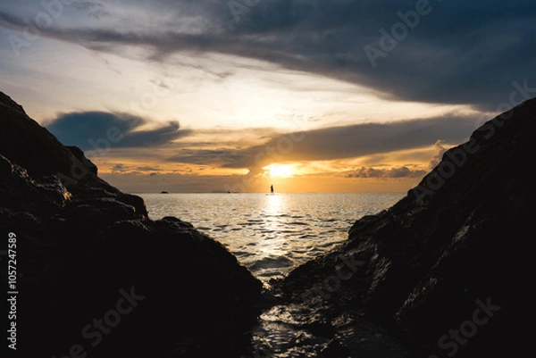 Obraz surfboarder  at sunset
