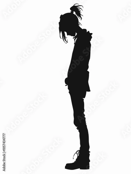 Fototapeta Person with a ponytail is standing in front of a white background. The person is wearing a hoodie and he is looking down. The image has a moody and introspective feel to it