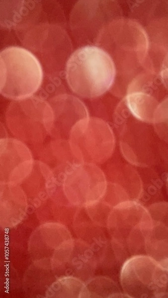Obraz A red background with many small circles. The circles are blurry and overlapping