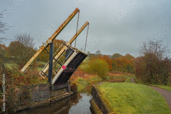 Obraz Bridge 23 in a raised position on the Caldon Canal, Stockton Brook during autumn.