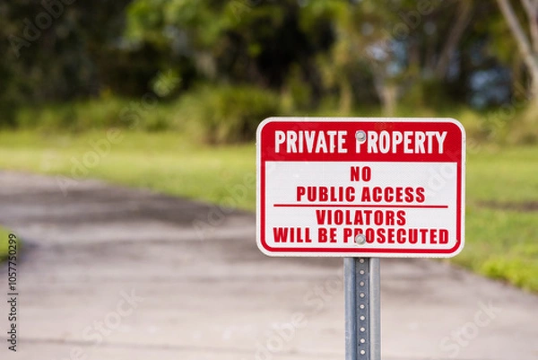 Obraz PRIVATE PROPERTY, NO PUBLIC ACCESS, VIOLATORS WILL BE PROSECUTED sign screwed to a metal post, on path, room for copy