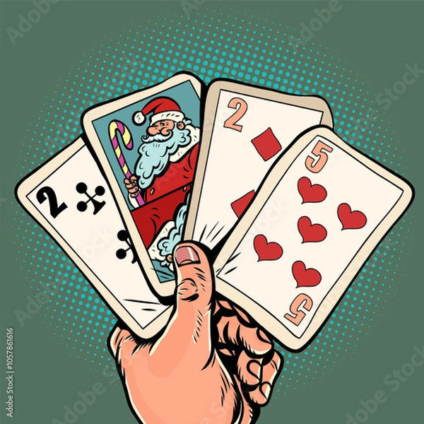 Fototapeta Cards with Santa Claus for New Year and Christmas. Play a trump card from your hand in winter. Hand with cards and a symbol of the New Year holiday.