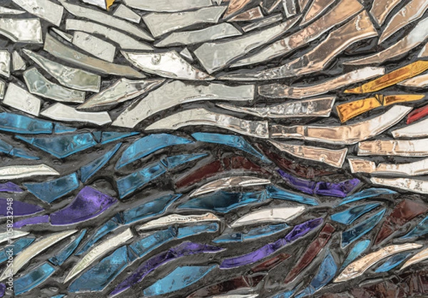 Fototapeta The walls are decorated with colorful Stained glass scraps mosaic. Scraps glass texture background, Creativity, art and design, Space for text, Selective focus.