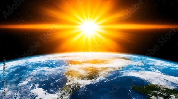 Fototapeta Sunrise over Earth, a breathtaking view of the planet from space with the sun rising over the horizon, perfect for illustrating the beauty and fragility of our planet