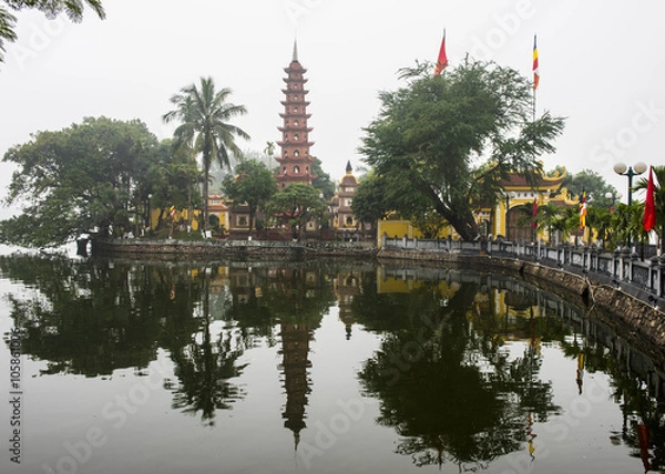 Fototapeta Viw of Tran Quoc Pagoda across the lake, Hanoi, Vietnam