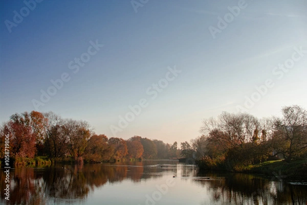 Fototapeta autumn landscape with lake