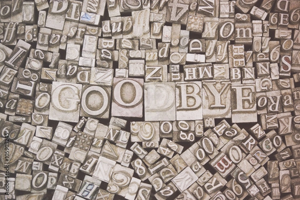 Fototapeta Close up of typeset letters with the word Goodbye
