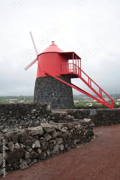 Fototapeta red windmill on pico of the azores