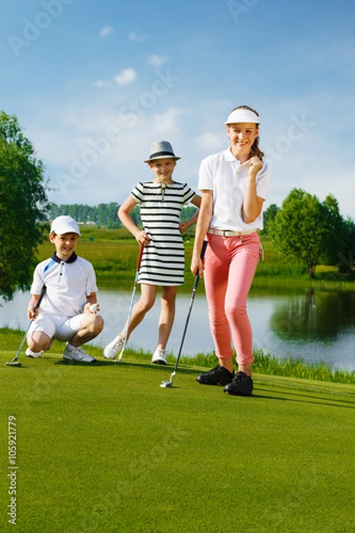 Fototapeta Kids playing golf