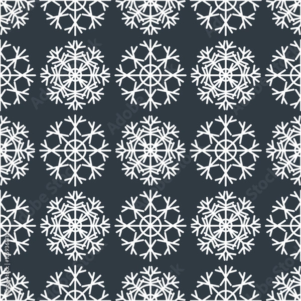 Fototapeta Seamless Christmas pattern of white geometric snowflakes on a gray background
