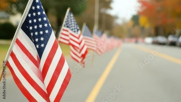 Obraz American flags lining the street for a Veterans Day parade, honoring community heroes