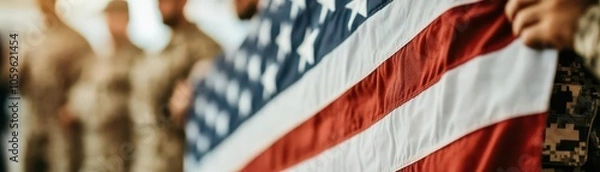 Obraz Veterans holding a large flag at a ceremony, symbolizing unity, strength, and gratitude