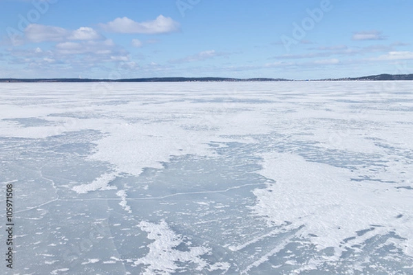 Obraz The surface of the lake covered with ice