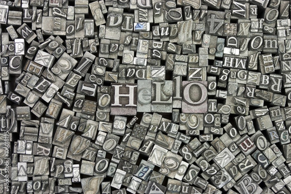 Fototapeta Close up of typeset letters with the word Hello
