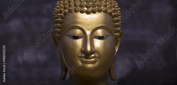Fototapeta Golden Buddha statue close up
