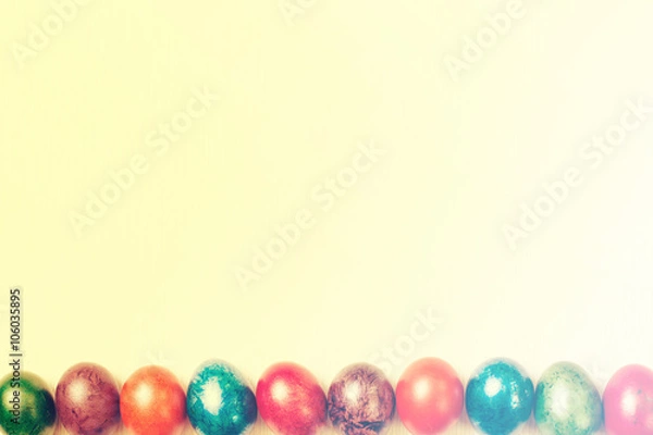 Obraz Easter eggs isolated on white wooden background